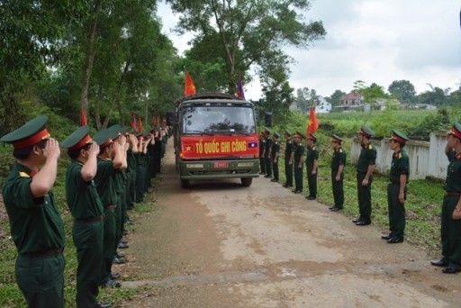 Đón nhận và an táng hài cốt liệt sỹ Việt Nam hy sinh tại Lào  - ảnh 1